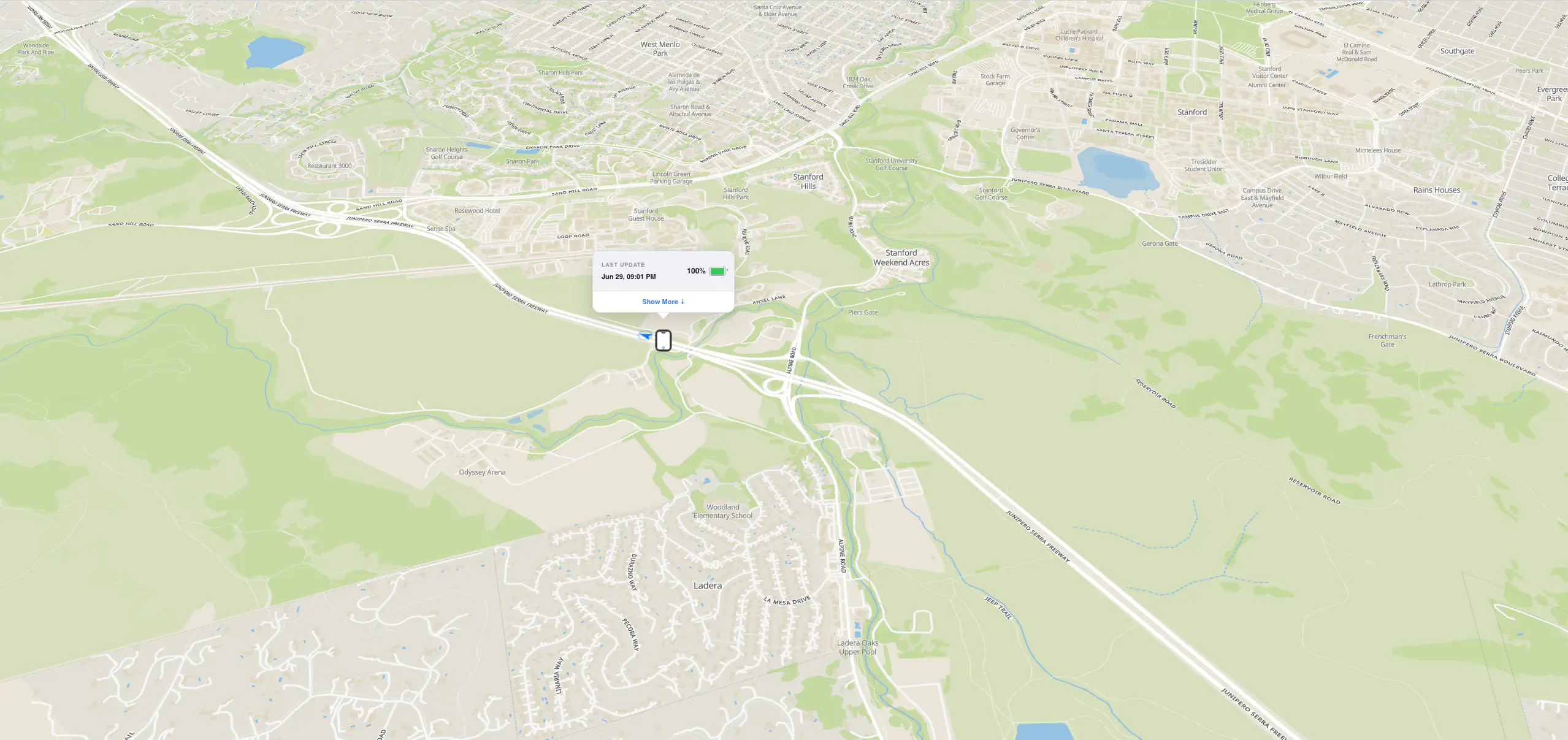 Real-time GPS tracking interface showing a device position on an interactive map with battery at 100 percent and last update timestamp